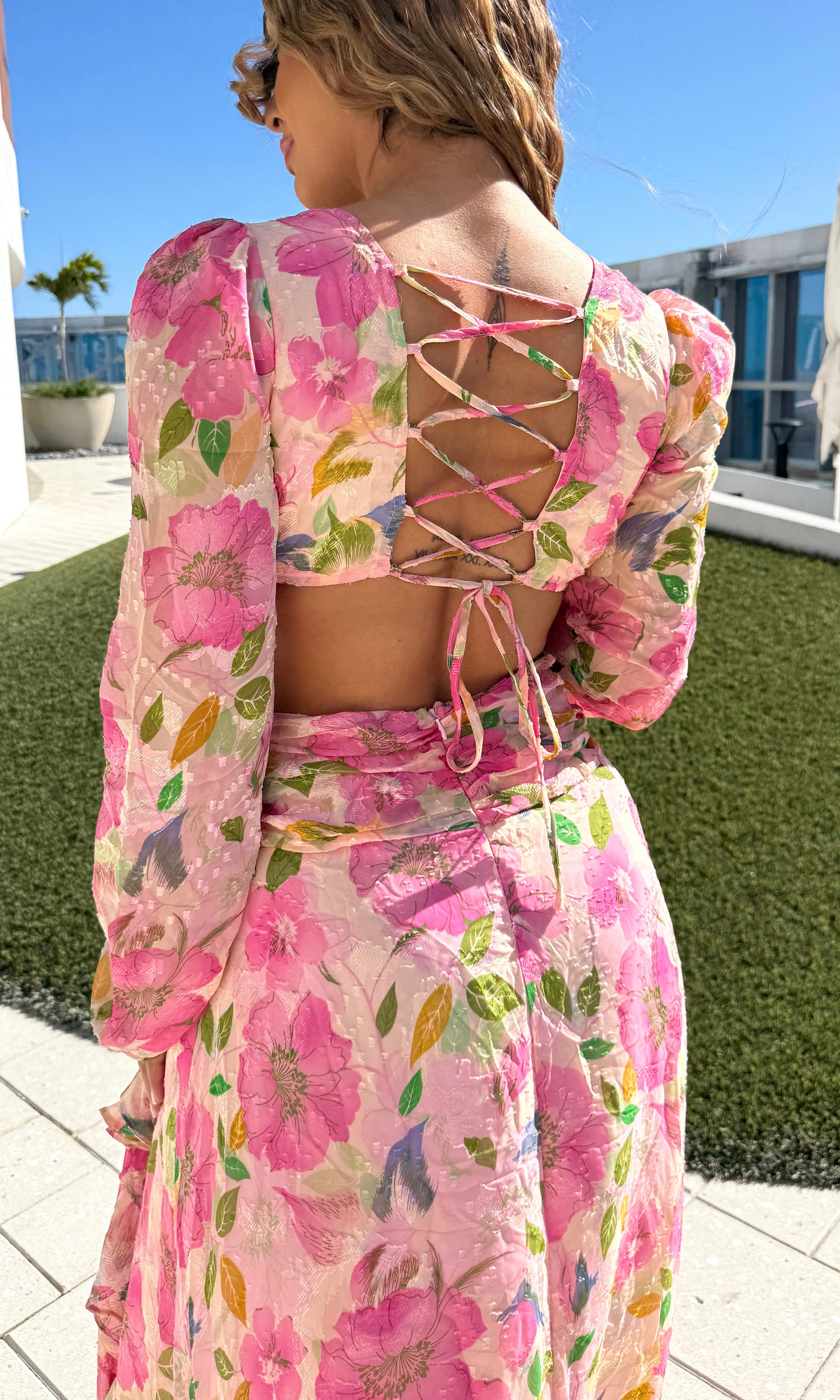 Pink Floral Open Back Flowy Ruffled Maxi Dress | Elite Styles Boutique Pink Floral Open Back Flowy Ruffled Maxi Dress | Elite Styles Boutique
