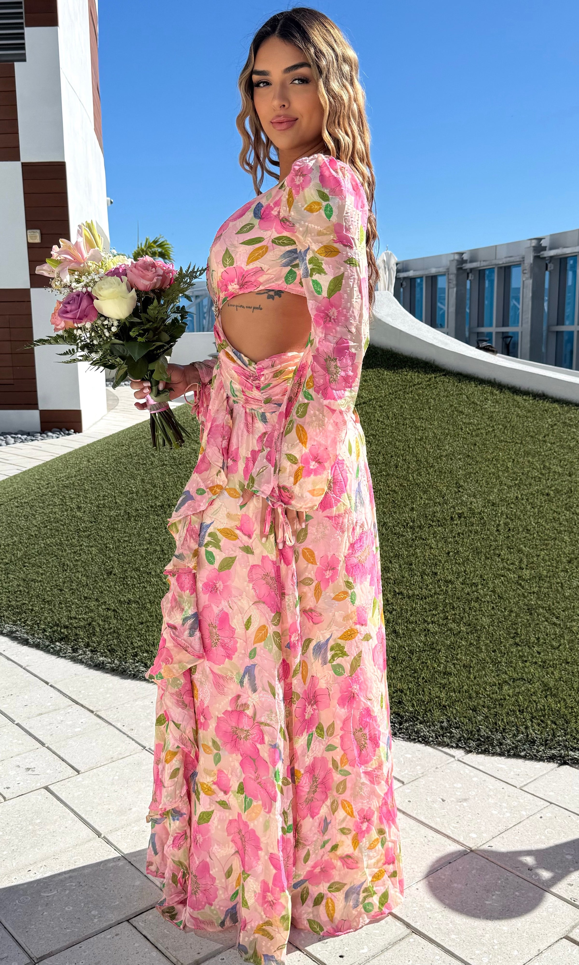 Pink Floral Open Back Flowy Ruffled Maxi Dress | Elite Styles Boutique Pink Floral Open Back Flowy Ruffled Maxi Dress | Elite Styles Boutique